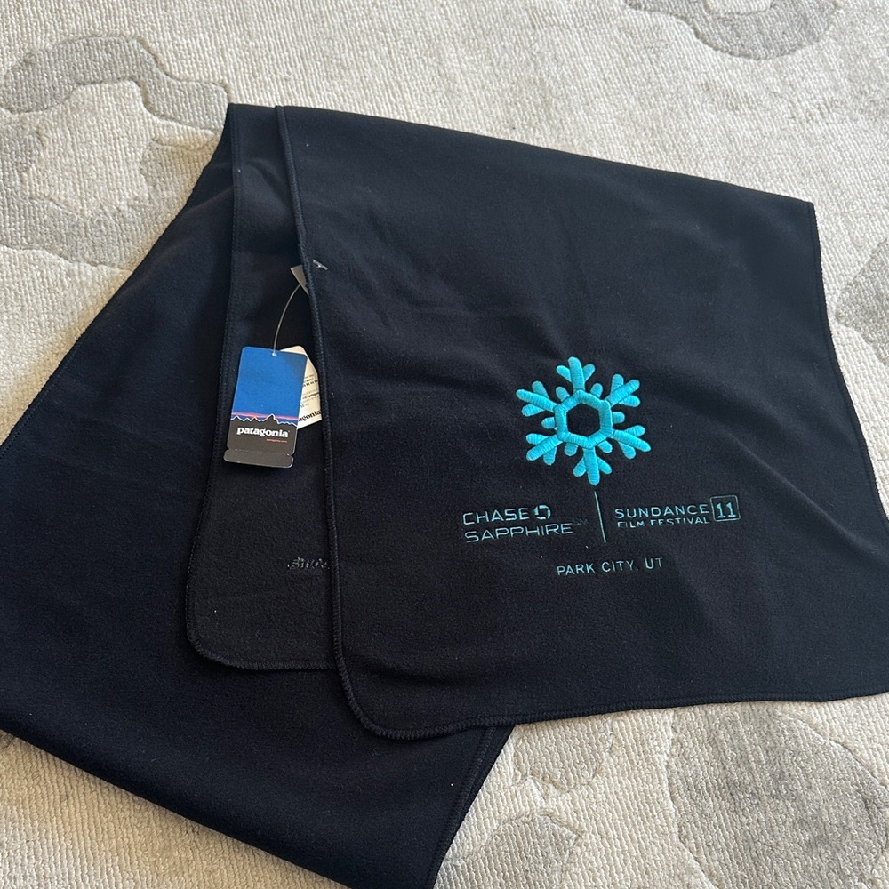 Patagonia Black Sundance film festival Scarf with Blue Snowflake Design